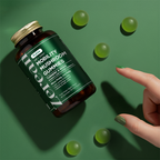 Zerean Flexa Mobility Mushroom Gummies bottle with green gummies and hand reaching — turmeric and reishi formula for women’s joint and mobility support.